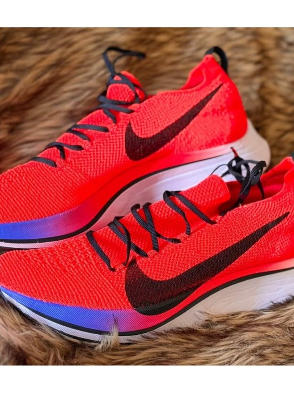 Nike Vaporfly 4% Flyknit. Men’s 10. Neon orange.